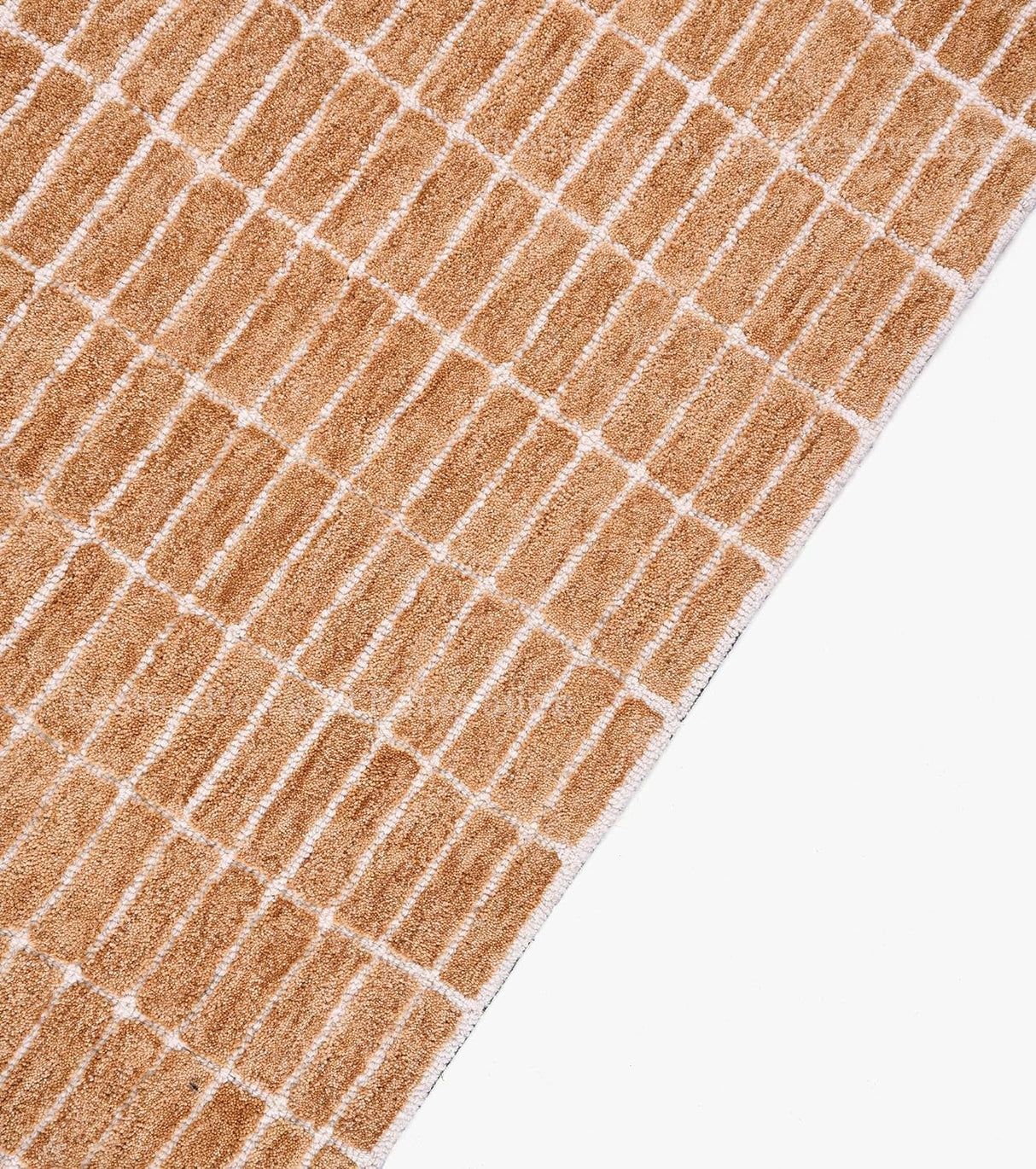 Close-up brown-beige wool rug with grid design.