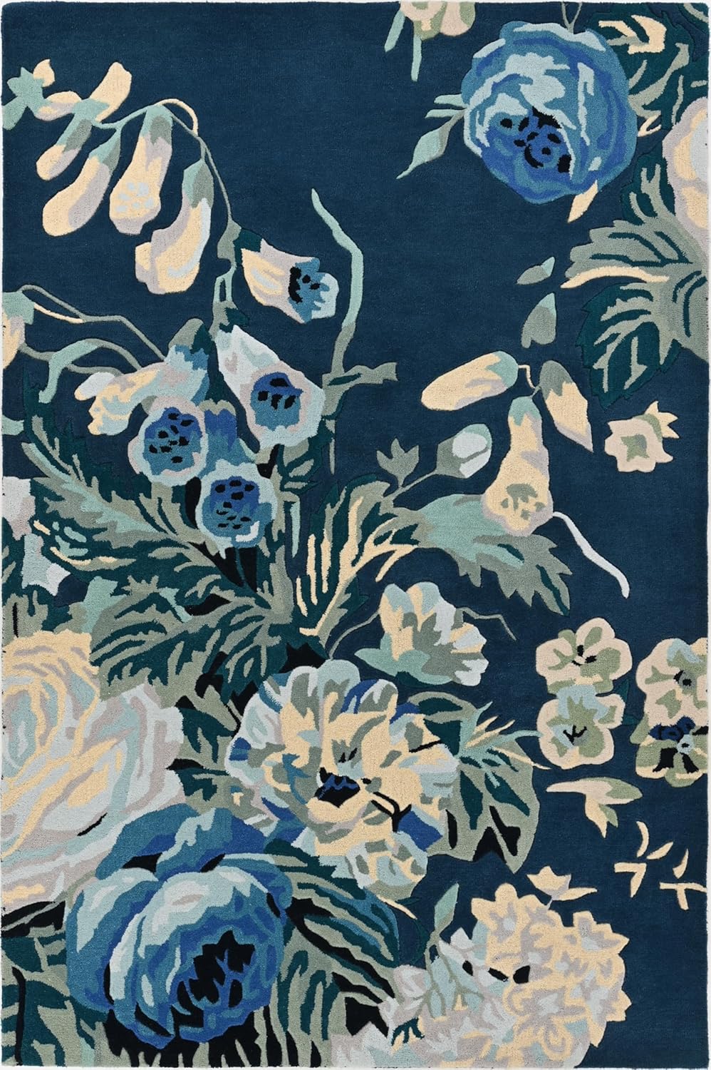 Close-up dark blue floral rug with light blue, cream flowers.
