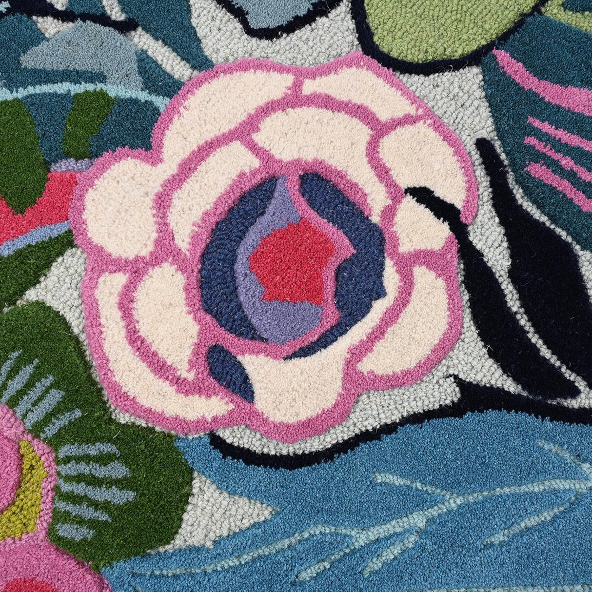 Handmade Floral Wool Area Rug - Irregular Oval Shape