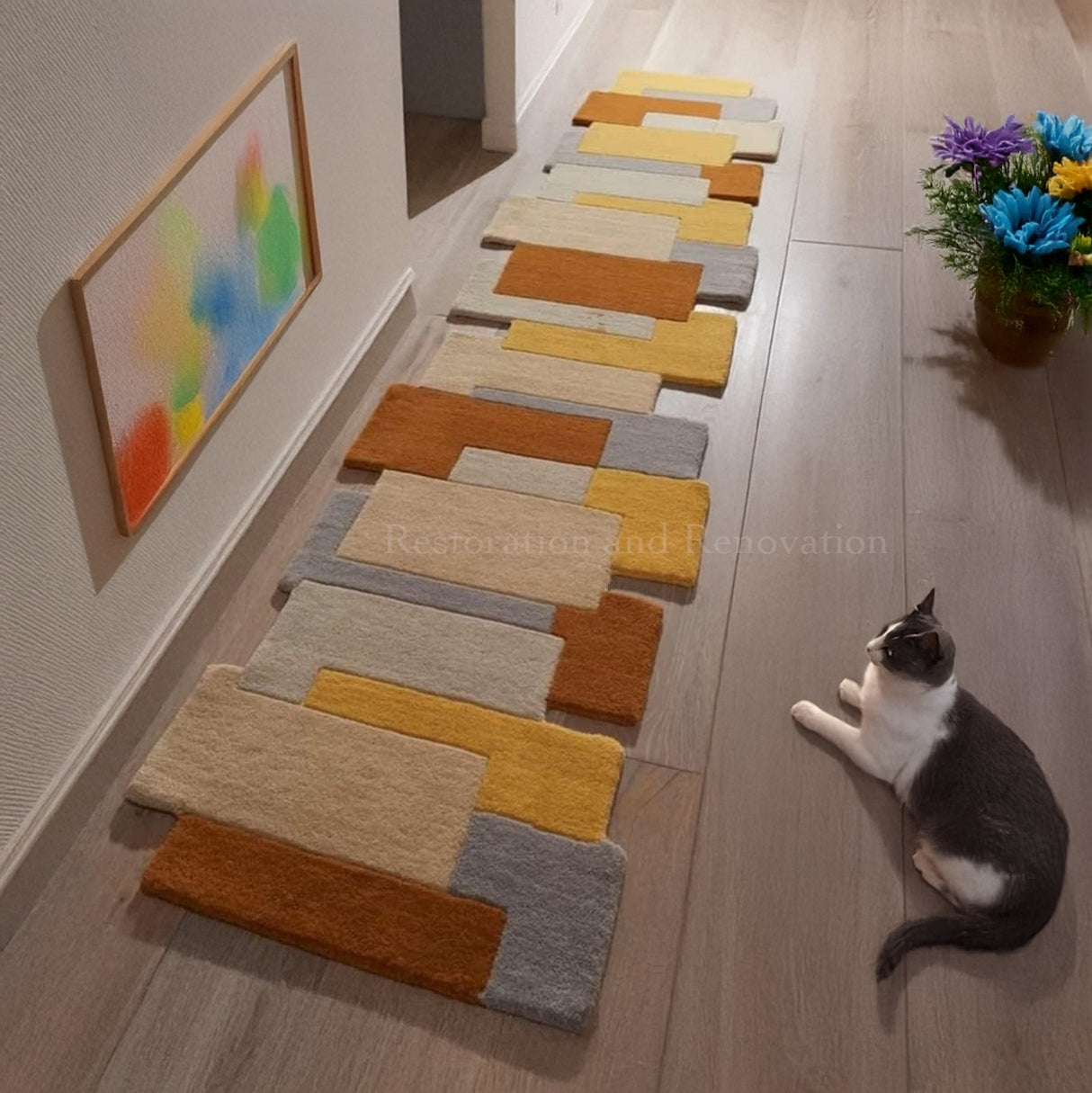 Hallway with light wood floor, colorful runner rug.